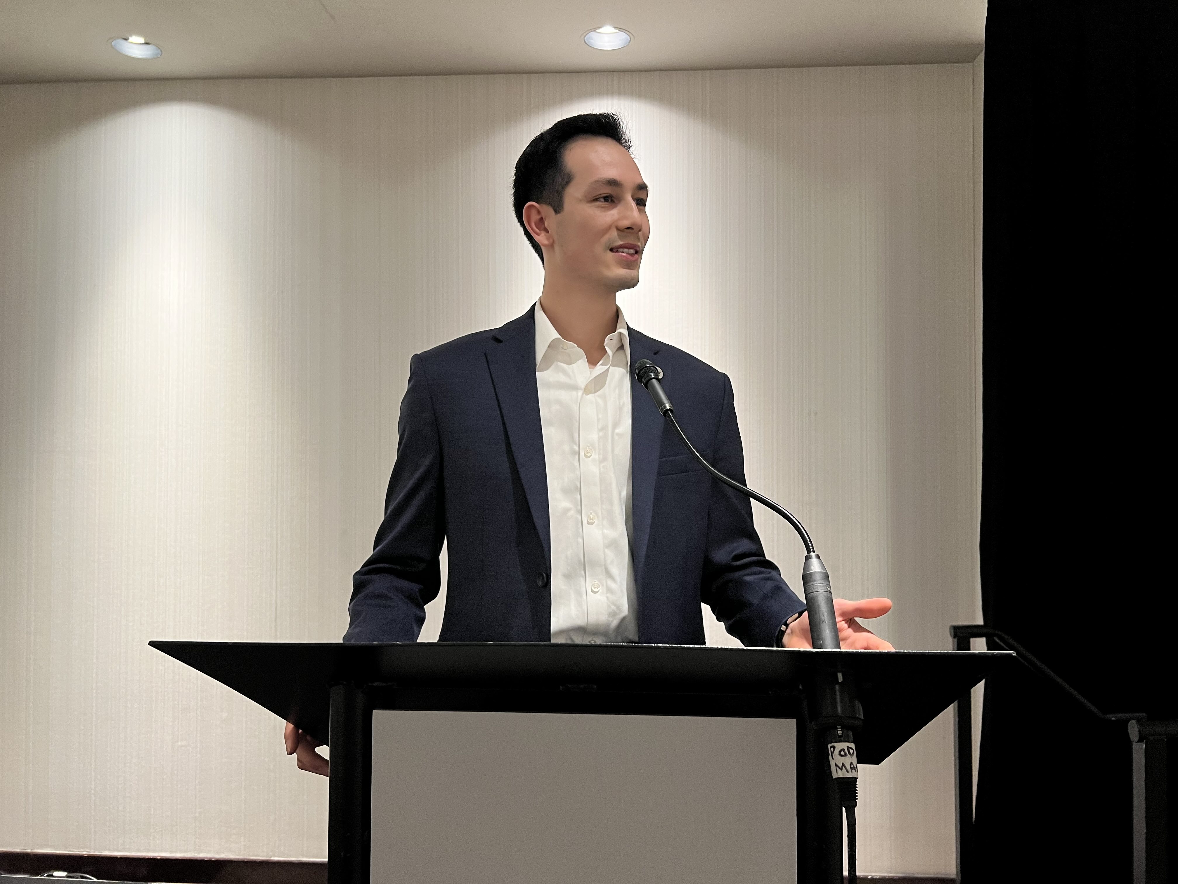 Matthew speaking at a Health Sciences Association of BC event